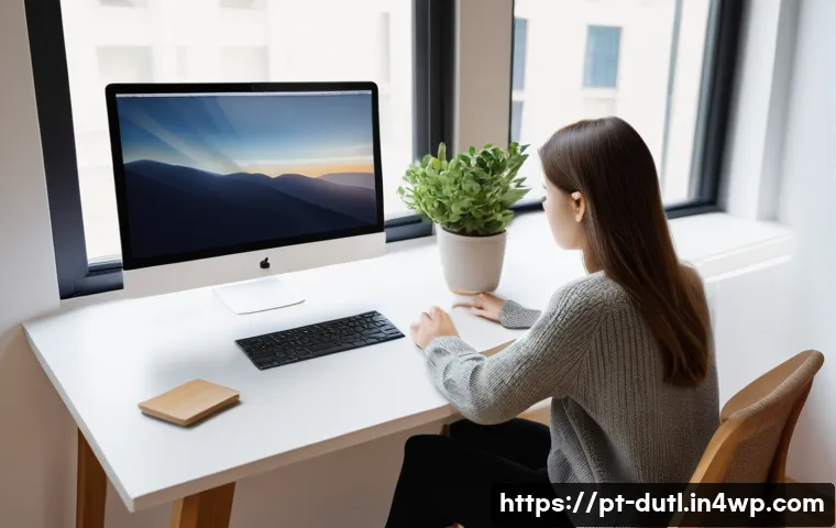 디지털 주의력 관리의 필요성을 느끼는 순간 - **Prompt for Focused Workstation:**
    A young adult, possibly a student or creative professional, ...